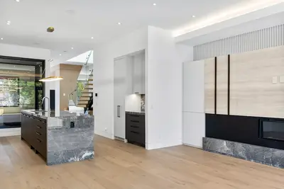 Bright open-plan kitchen in a sample buyer-advice post